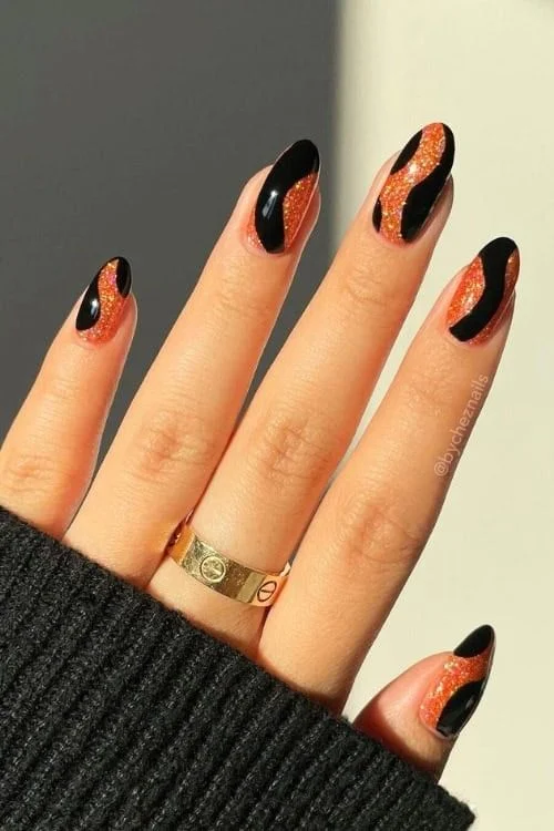 16 Fall Pumpkin Nails Ideas That Bring Cozy Autumn Charm To Your Manicure 10 Black And Pumpkin Orange Nails