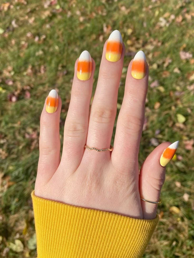 14 Fall Halloween Nails Ideas That Mix Spooky Charm With Cozy Autumn Style 8 Candy Corn Halloween Nails