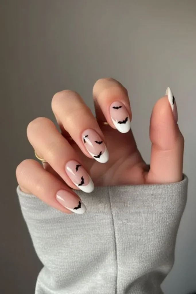 14 Fall Halloween Nails Ideas That Mix Spooky Charm With Cozy Autumn Style 10 Cute Bat Accent Halloween Nails
