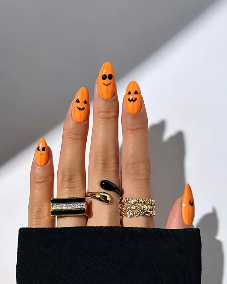 16 Fall Pumpkin Nails Ideas That Bring Cozy Autumn Charm To Your Manicure 5 Cute Pumpkin Face Halloween Nails