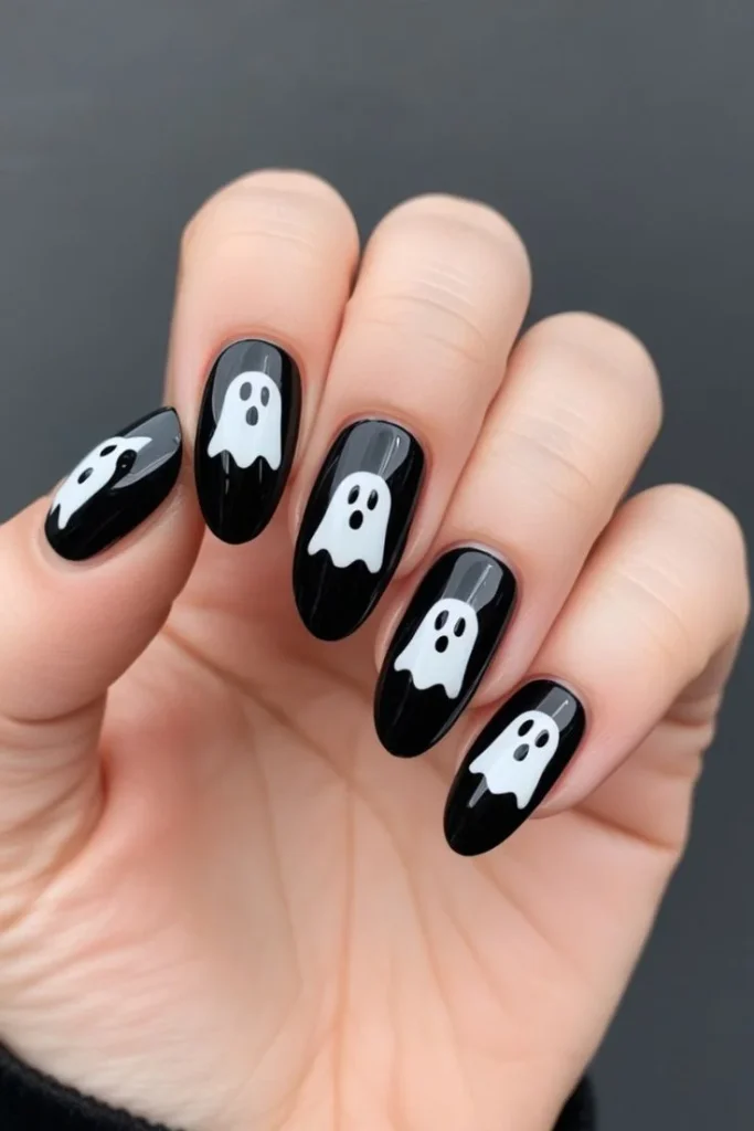 14 Fall Halloween Nails Ideas That Mix Spooky Charm With Cozy Autumn Style 3 Ghost Accent Fall Halloween Nails