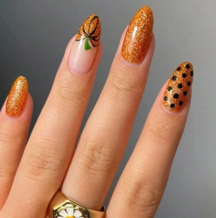 16 Fall Pumpkin Nails Ideas That Bring Cozy Autumn Charm To Your Manicure 11 Pumpkin Glitter Nails