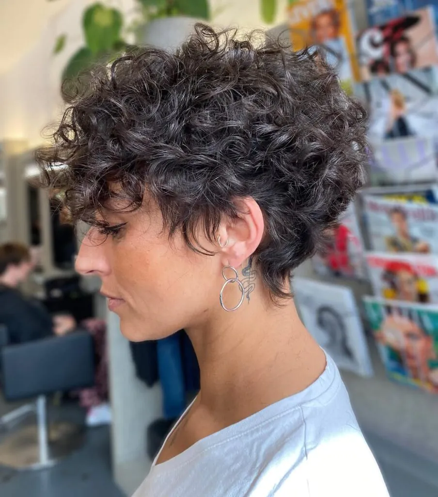 14 Short Black Hair Looks That Are Breaking the Internet 9 The Curly Pixie with Volume
