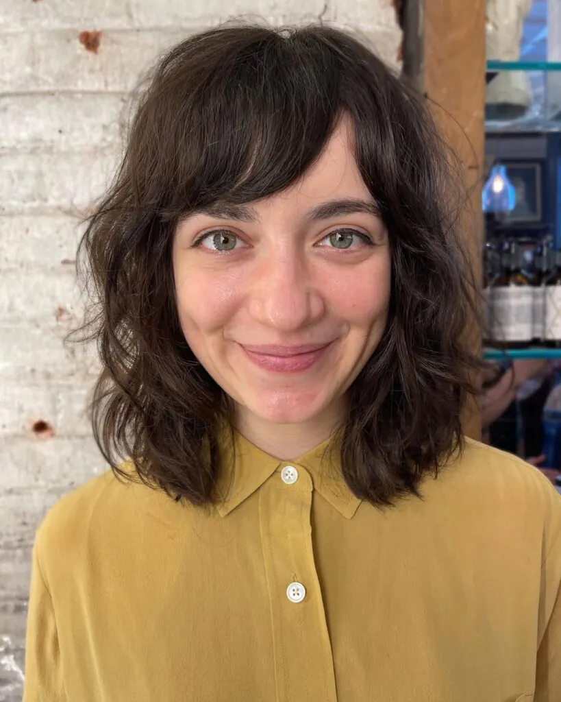 14 Short Black Hair Looks That Are Breaking the Internet 11 The Side-Swept Bang Bob