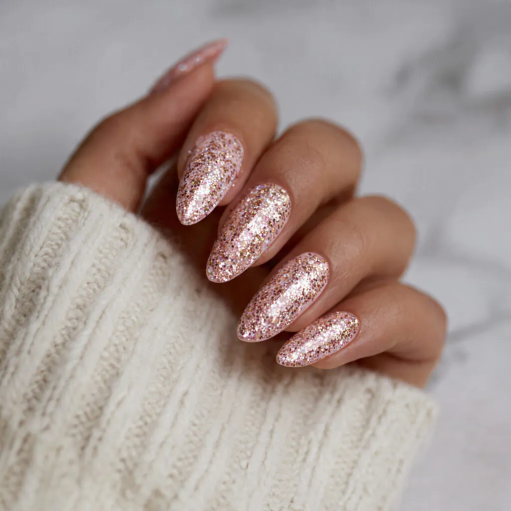 12 Almond Nails Designs That Instantly Make Your Hands Look Expensive (Yes, Even on Lazy Days) 10 glitter almond nails 1