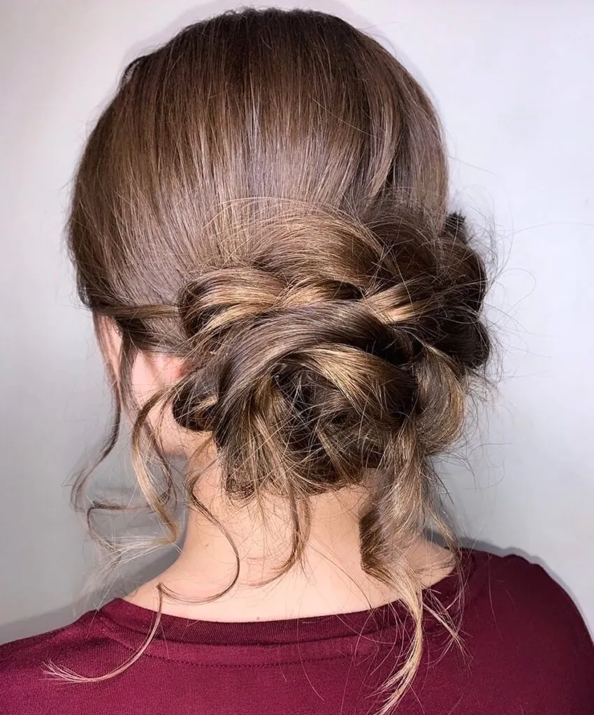 15 Wedding Hairstyles Ideas That Will Make You Feel Like the Main Character on Your Big Day 9 Floral Braided Updo