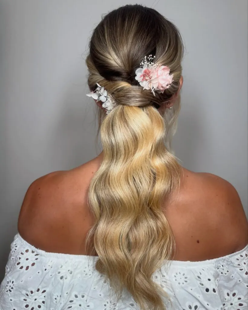 15 Wedding Hairstyles Ideas That Will Make You Feel Like the Main Character on Your Big Day 10 Low Ponytail with Soft Waves